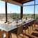 A table set for a wine tasting overlooking the Sardinian countryside